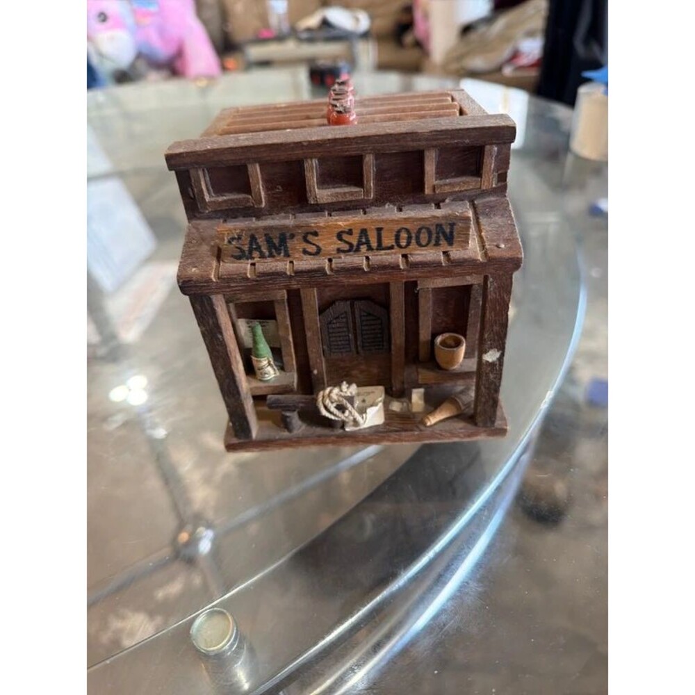 vintage Enesco "Sam's Saloon" wooden coaster caddy from the 1970s.